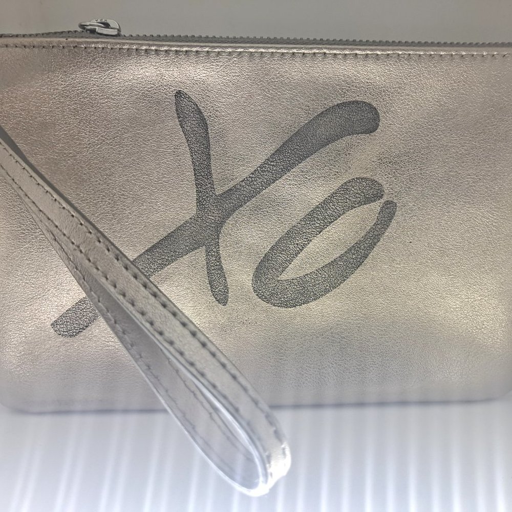 NWOT Banana Republic gold leather wristlet.